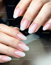 Close up of hands with natural ombre manicure