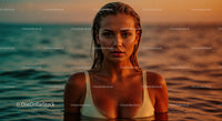 Close-Up of a Woman with Wet Hair and Water Droplets at Sunset