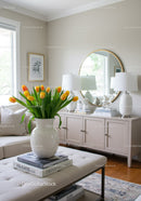Bright and Cozy Living Room with Tulips and Elegant Decor