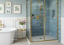 Elegant bathroom with gold accents and fresh flowers