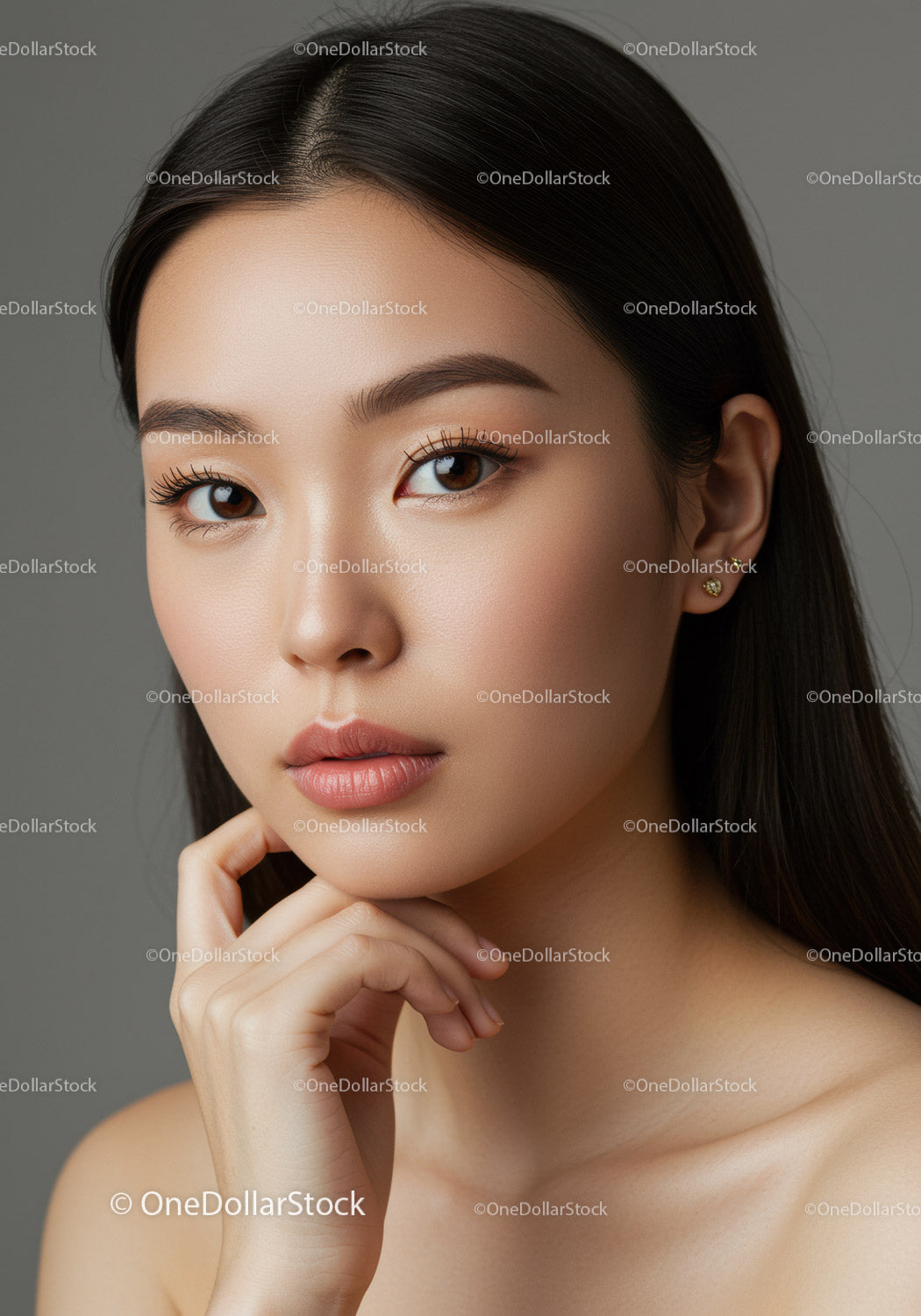 Portrait of Elegant Young Woman with Clear Skin and Brown Eyes