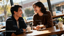Happy couple enjoying coffee date in cozy cafe
