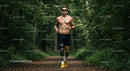 Active Man Running Through Forest Nature Trail for Fitness and Health