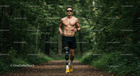 Active Man Running Through Forest Nature Trail for Fitness and Health