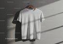 White T Shirt Hanging on Wooden Hanger with Shadows JPG Mockup Image preview