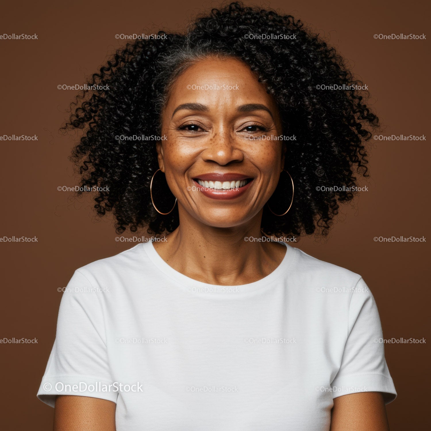 Confident Smiling Woman with Curly Hair and Hoop Earrings