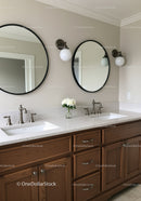 Modern Bathroom with Wooden Vanity and Oval Mirrors