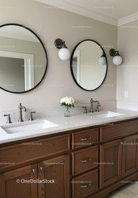 Modern Bathroom with Wooden Vanity and Oval Mirrors