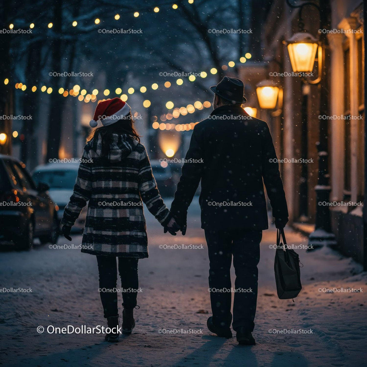 Couple holding hands on snowy festive street at dusk