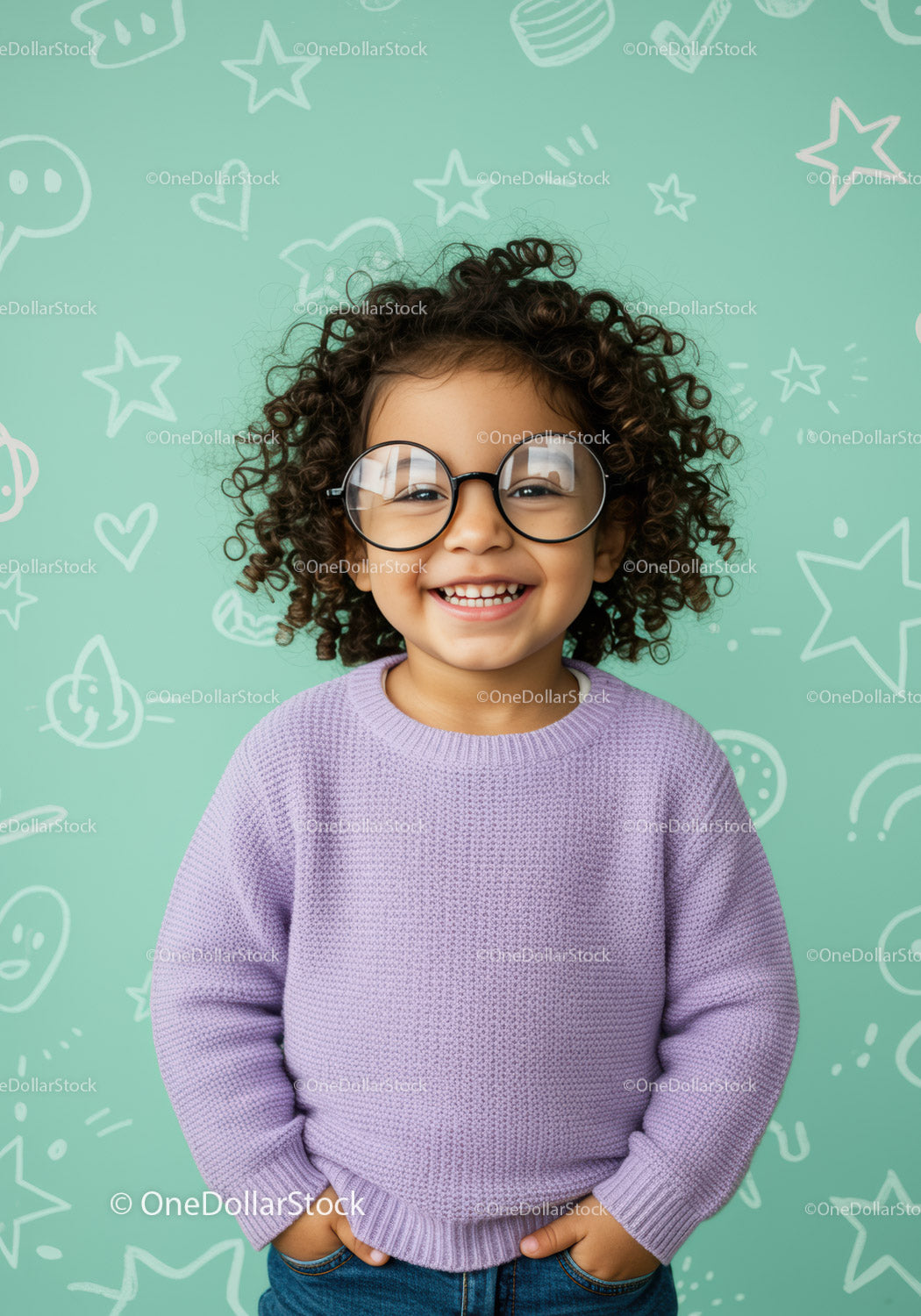 Smiling curly child with big round glasses and cozy sweater