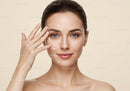 Young Woman Performing Facial Massage with Arrows Indicating Areas