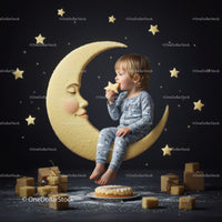 Toddler enjoying star shaped cookie on crescent moon