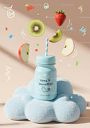 Blue smoothie bottle on soft cloud with floating fruits