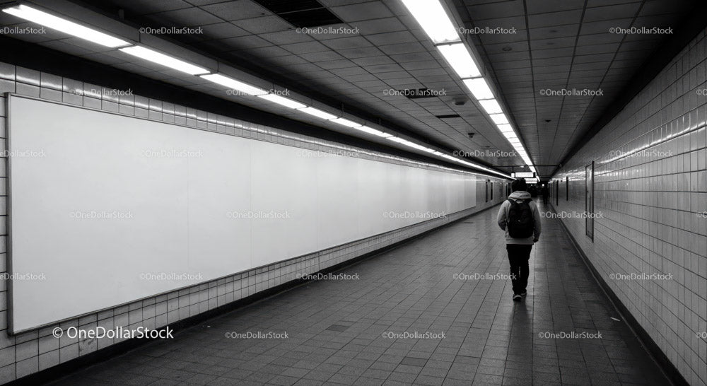 Minimalist Subway Tunnel with Tiled Walls and Modern Lighting
