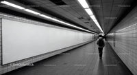Minimalist Subway Tunnel with Tiled Walls and Modern Lighting