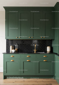 Stylish Green Kitchen Cabinets with Black Subway Tile Backsplash and Gold Hardware