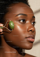 Close-up of Black Woman Receiving Skincare Treatment with Jade Roller