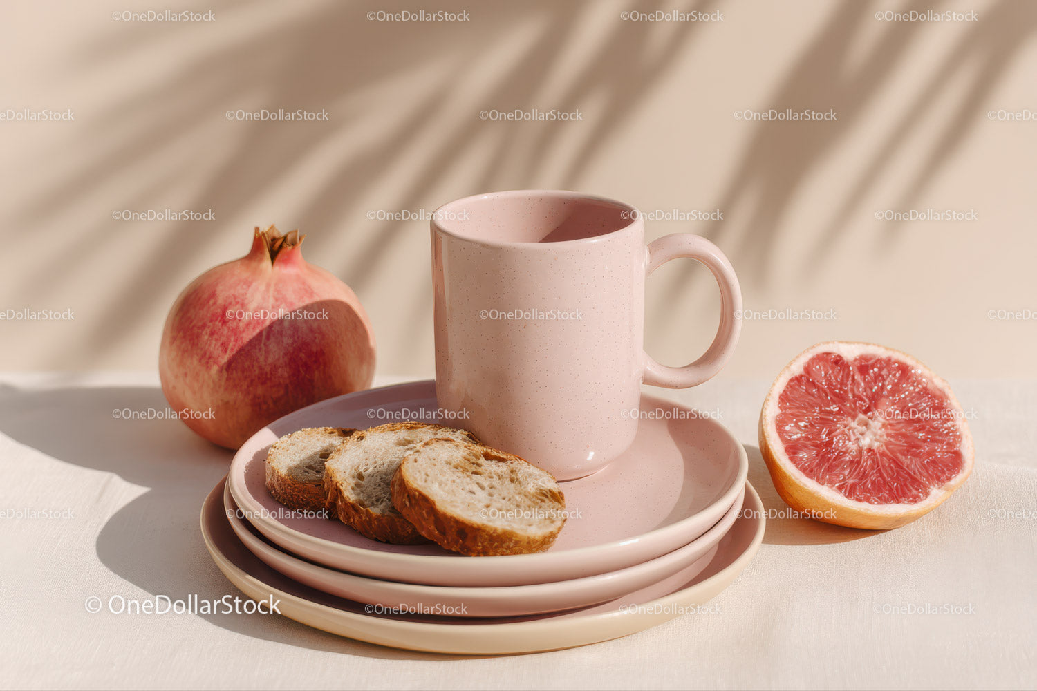 Fresh Pomegranate and Grapefruit with Pink Mug and Plates