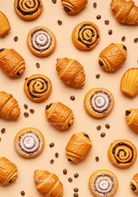 Assorted Fresh Pastries and Coffee Beans on Pastel Background