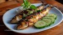 Grilled Fish with Cucumber Slices and Fresh Herbs