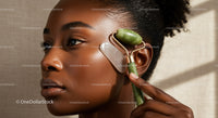 Woman Using Jade Roller and Gua Sha for Facial Massage with Natural Skin