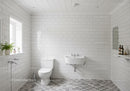 Bright Modern Bathroom with White Tiles and Grey Floor