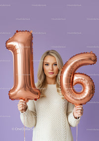 Young woman celebrating sweet sixteen with balloons
