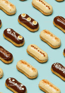 Assorted Gourmet Eclairs with Chocolate and Vanilla Glaze