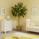 Lemon Tree in Stylish Modern Nursery with White Crib and Yellow Accents