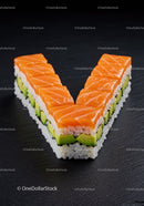 Fresh Salmon and Avocado Sushi Artfully Arranged on Black