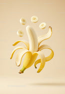 Fresh peeled banana with floating banana slices