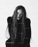 Elegant Black and White Fashion Portrait of a Confident Woman