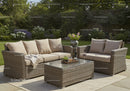Elegant Outdoor Garden Lounge Set with Cushions and Flowers