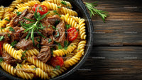 Hearty Beef and Cherry Tomato Pasta in Rustic Skillet