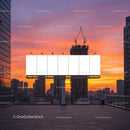 City Skyline with Construction Cranes and Sunset Sky