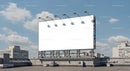 Empty rooftop billboard under clear blue sky