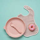 Minimalist baby dining set with bib and toy donut