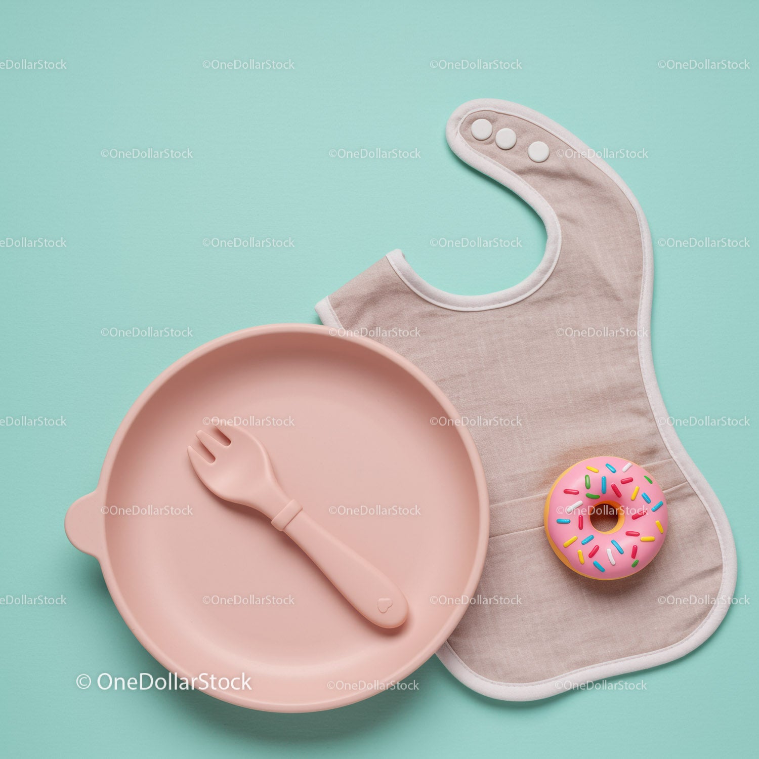 Minimalist baby dining set with bib and toy donut