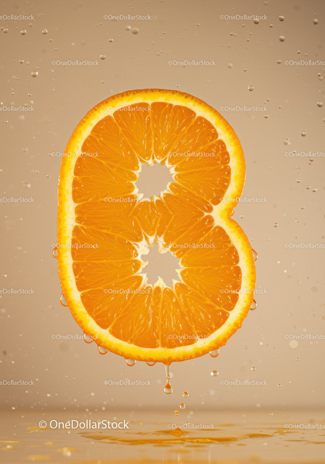 Juicy orange slice splashing in water droplets