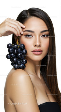 Elegant Woman with Long Brown Hair and Black Grapes