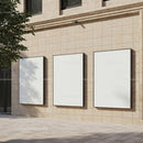 Three Blank Vertical Billboards on Modern Building Wall