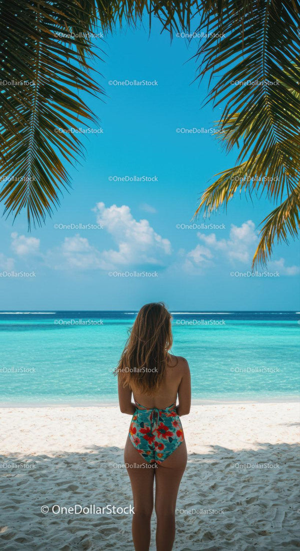 Tropical Beach Scene with Woman in Swimsuit Overlooked by Palm Leaves