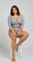 Confident Woman Sitting on Stool in Casual Loungewear