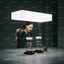 Barista Preparing Pour Over Coffee in Minimalist Setting