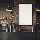 Barista Preparing Coffee Behind Industrial Cafe Counter