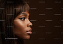 Close-Up Portrait of a Woman with Brown Hair and Dramatic Makeup