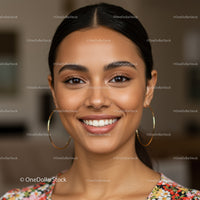 Close-Up of a Smiling Woman with Dark Hair and Bright Eyes