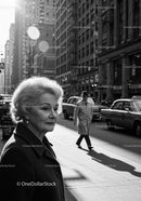 Elegant Elderly Woman on City Street in Black and White