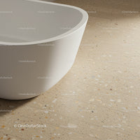 Elegant White Bathtub with Curved Design on Terrazzo Floor for Modern Bathroom