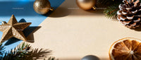 Festive golden Christmas ornaments on soft background